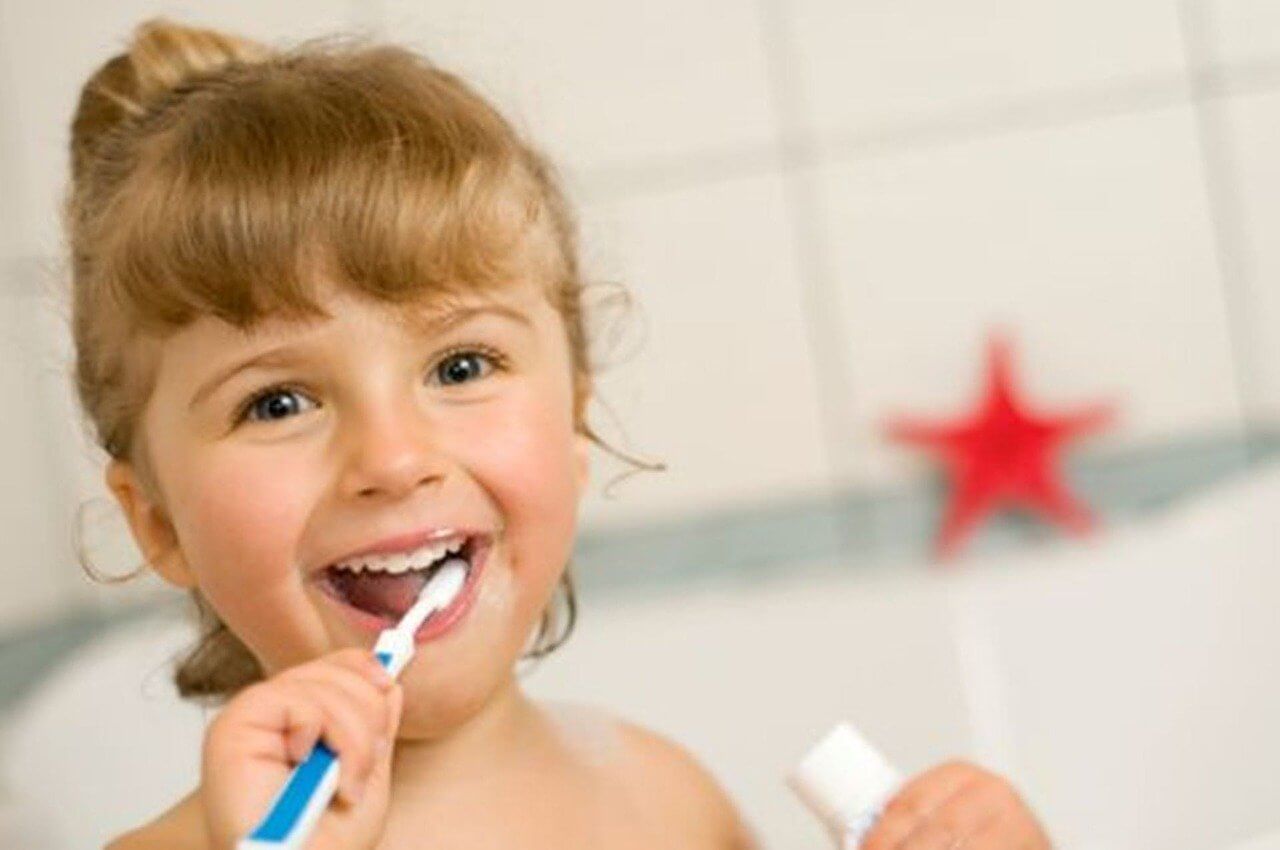 Hulme Court Dental and Implant Centre Dental Services - Children Dentistry Girl Brushing Her Teeth